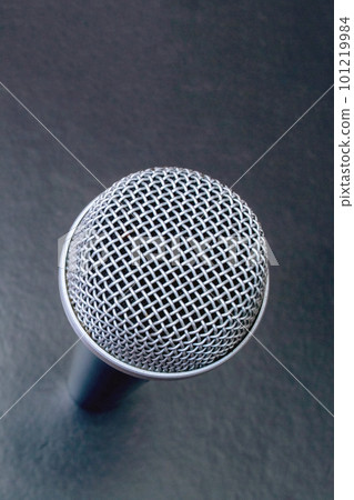Microphone on black background top view closeup 101219984