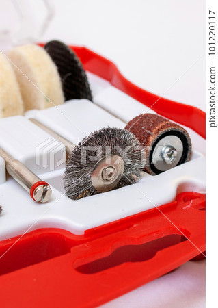 Set of nozzles for engraver in plastic box on white background Set of nozzles for engraver in plastic box on white background 101220117