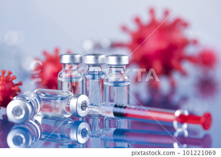 Close up medical syringe with a vaccine Close up medical syringe with a vaccine 101221069