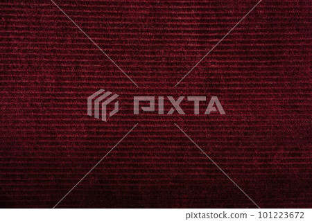 Burgundy red corduroy background texture. Ribbed velvet textile pattern Burgundy red corduroy background texture. Ribbed velvet textile pattern 101223672