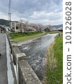 Bridge and flower raft over the river 101226028