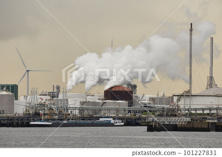 Industrial oil port and facilities smoking in the background 101227831