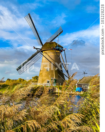 Kinderdijk windmills and water canal in Netherlands, Europe Kinderdijk windmills and water canal in Netherlands, Europe 101228228