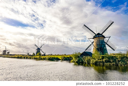 Kinderdijk windmills and water canal in Netherlands, Europe Kinderdijk windmills and water canal in Netherlands, Europe 101228252