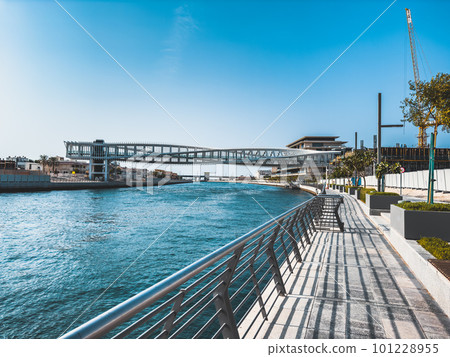 Dubai Water Canal Helix Bridge, pedestrian bridge with water taxi, in Dubai, UAE 101228955