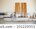 glass jars for storing food in the kitchen. order on the shelves 101229353