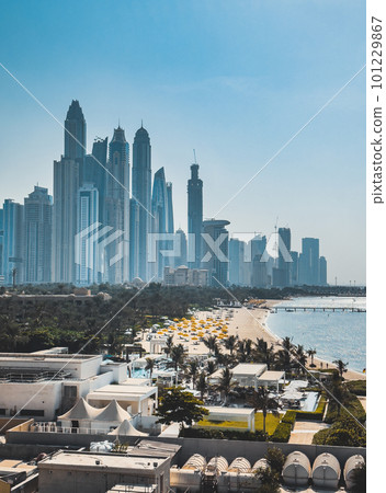 View from the promenade and tram monorail in The Palm Jumeirah island in Dubai, UAE View from the promenade and tram monorail in The Palm Jumeirah island in Dubai, UAE 101229867