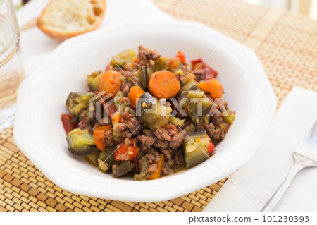 dish of vegetable stew. stewed eggplant, minced meat, carrots, peppers, onion squid dish of vegetable stew. stewed eggplant, minced meat, carrots, peppers, onion squid 101230393