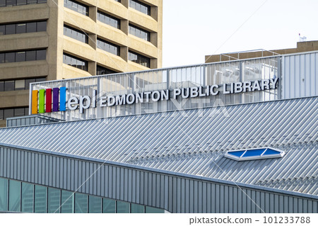Edmonton, Alberta, Canada. Mar 30, 2023. A sign at top of the Edmonton Public Library, largest lender of information and entertainment in Edmonton downtown. 101233788