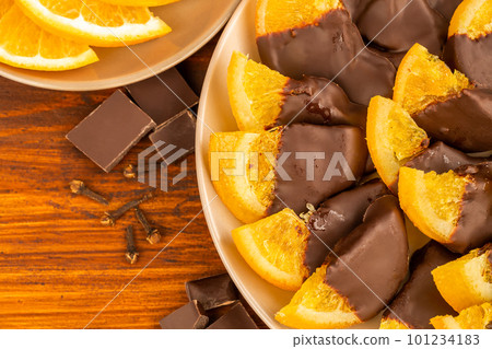 Orange slices in chocolate Orange slices in chocolate 101234183
