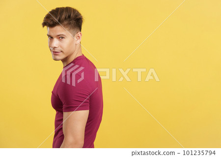 Strong man turning to look at the camera 101235794