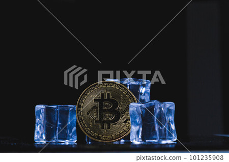 Ice and bitcoin coin. Freezing of cryptocurrency accounts. Frozen bitcoin coin. Ice and bitcoin coin. Freezing of cryptocurrency accounts. Frozen bitcoin coin. 101235908