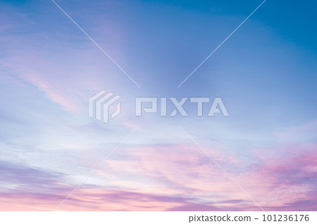 Sky with soft and fluffy pastel pink and blue colored clouds. Sunset background. Nature. sunrise. Instagram toned style Sky with soft and fluffy pastel pink and blue colored clouds. Sunset background. Nature. sunrise. Instagram toned style 101236176