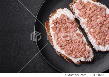 Delicious sandwiches consisting of grilled toast, canned tuna and cream cheese Delicious sandwiches consisting of grilled toast, canned tuna and cream cheese 101236460
