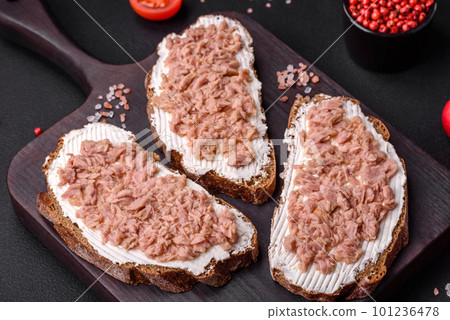 Delicious sandwiches consisting of grilled toast, canned tuna and cream cheese Delicious sandwiches consisting of grilled toast, canned tuna and cream cheese 101236478