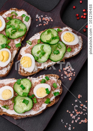 Delicious sandwiches consisting of grilled toast, canned tuna, cream cheese Delicious sandwiches consisting of grilled toast, canned tuna, cream cheese 101236488