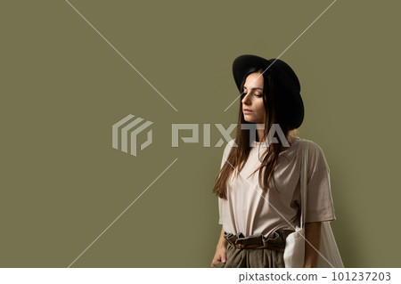 Ecology Concept. Woman holding cotton grocery bag with vegetables. Reusable eco bag for shopping. Zero waste concept. Eco friendly lifestyle. Isolated white background. 101237203