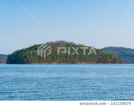 Sunny view of the landscape of Broken Bow Lake in Beavers Bend State Park Sunny view of the landscape of Broken Bow Lake in Beavers Bend State Park 101238079