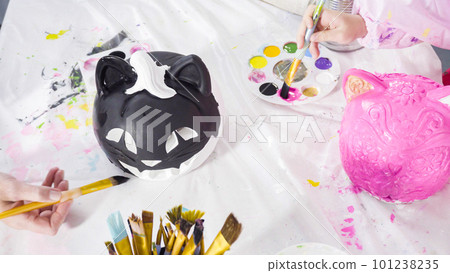 Painting craft pumpkin with acrylic paint for Halloween. Painting craft pumpkin with acrylic paint for Halloween. 101238235