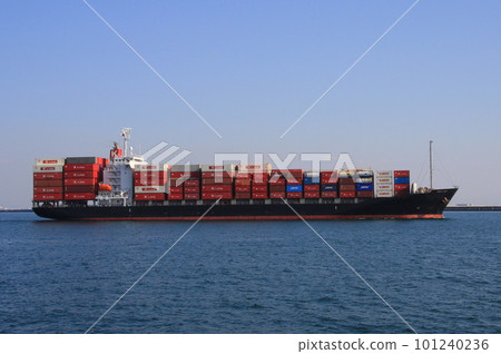 A full container ship underway (view from a pleasure boat) 101240236