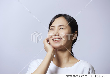 Portrait of a young Japanese woman showing her bare skin Portrait of a young Japanese woman showing her bare skin 101241756