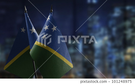 Small flags of the Solomon on an abstract blurry background 101248975