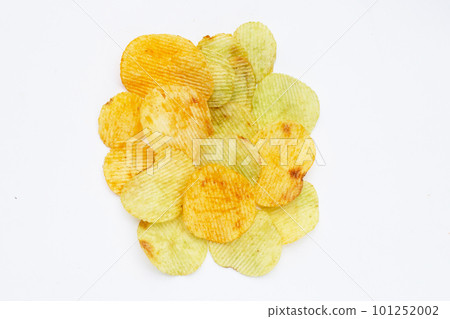 Potato chips on white background. 101252002