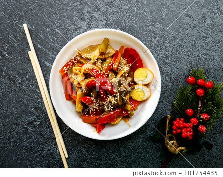 A bowl of soba noodles with mushrooms, onions and A bowl of soba noodles with mushrooms, onions and 101254435