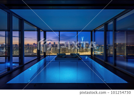 A room with a pool with a night view of the big city A room with a pool with a night view of the big city 101254730
