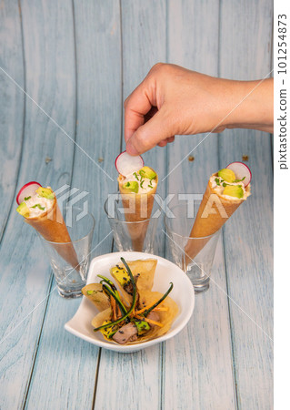 Brick and cornet with pieces of red tone 101254873