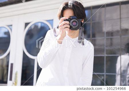 A man with a camera 101254966