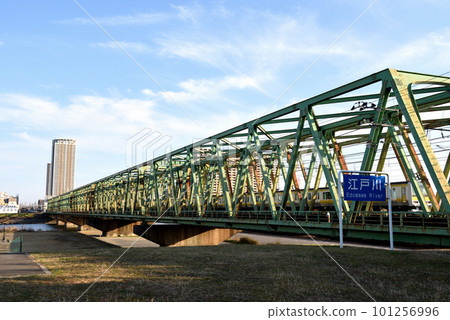 A train passing the iron bridge over the Edo River on the JR Sobu Line 101256996