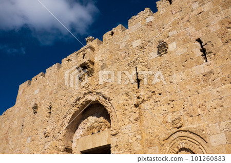 Medieval building with arched windows in daylight Medieval building with arched windows in daylight 101260883