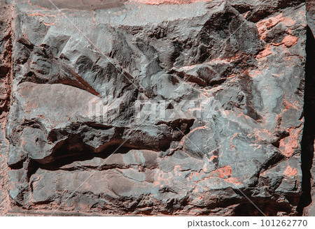 Stone texture of an old rough building wall with cracks, reliefs, plots. Random pattern 101262770