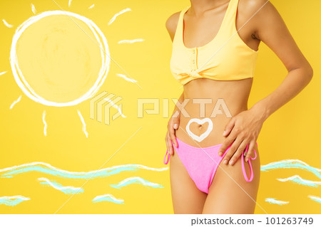 Woman has a heart made with sunscreen Woman has a heart made with sunscreen 101263749