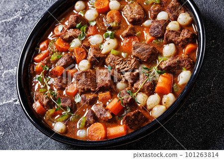 boneless beef short ribs stew in black bowl 101263814