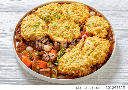 boneless beef short ribs cobbler in white bowl boneless beef short ribs cobbler in white bowl 101263815