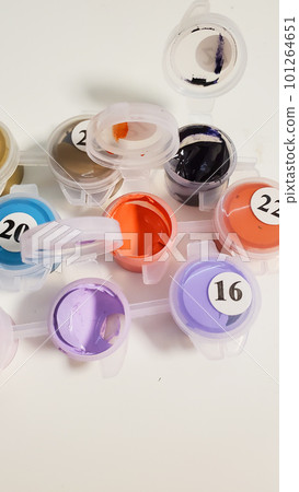 Painting on canvas by numbers with acrylic paints. The paint for drawing has dried up Painting on canvas by numbers with acrylic paints. The paint for drawing has dried up 101264651