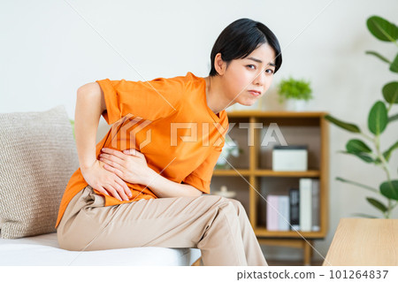 young woman with a sore side 101264837