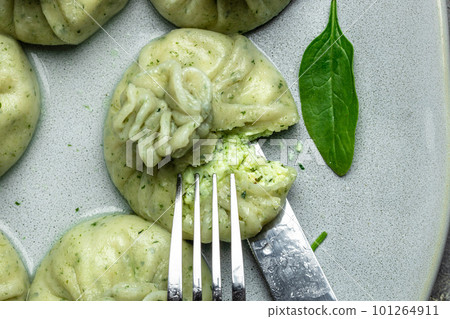 Hot Khinkali with cheese and spinach. Restaurant menu, dieting, cookbook recipe top view 101264911