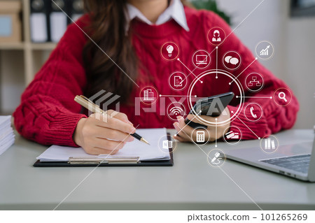 Hand using smart phone, mobile p payments online shopping, omni channel, digital tablet docking keyboard computer. Hand using smart phone, mobile p payments online shopping, omni channel, digital tablet docking keyboard computer. 101265269