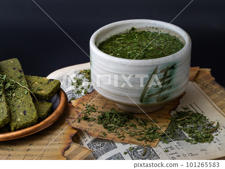 Enjoy with A Cup of CBD herbal tea is served with the Homemade Cannabis Snack Sticks on the Old Music Notebook. Enjoy with A Cup of CBD herbal tea is served with the Homemade Cannabis Snack Sticks on the Old Music Notebook. 101265583