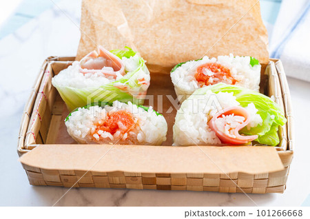 Spring roll rice balls packed in a basket 101266668