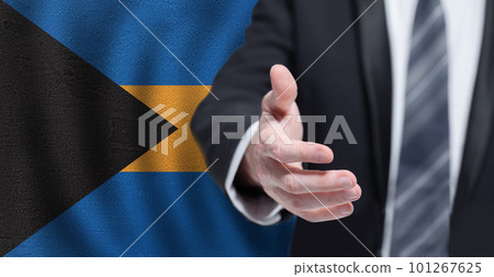 Business hand on Bahamian flag background. Welcome to the Bahamas 101267625