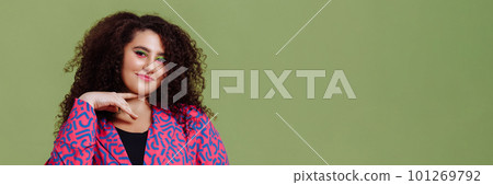 A young woman with a plus size figure with an Afro hairstyle A young woman with a plus size figure with an Afro hairstyle 101269792