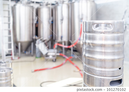 beer barrels with beer in a brewery 101270102