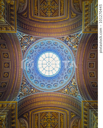 View underneath the glass dome and golden ornate ceiling, architectural details inside the Versailles palace hall, Gallery of Great Battles, the largest room in the castle of the sun king Louis XIV 101270445