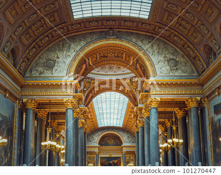 Beautiful architectural details of the Gallery of Great Battles in the palace of Versailles, France. The largest room in the castle, golden ornaments, marble columns 101270447