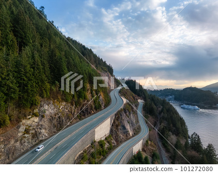 Aerial View of Sea to Sky Highway in Howe Sound. Sunset Sky. 101272080