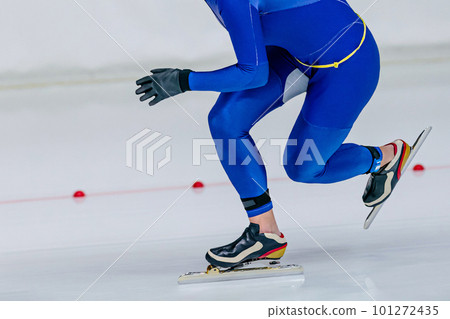 close-up male skaters run srint race in speed skating competition, winter sports games 101272435